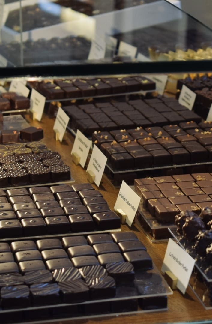 Artisan chocolate tasting on Marais food tour Paris - French chocolatier featured on Nora's guided food and wine tours