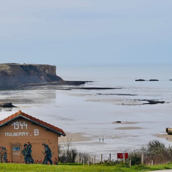 D-Day Mulberry Harbour Arromanches Gold Beach artificial port remains - Paris and Beyond Tours Normandy WWII battlefield history tour France