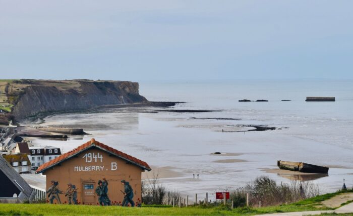 D-Day Mulberry Harbour Arromanches Gold Beach artificial port remains - Paris and Beyond Tours Normandy WWII battlefield history tour France
