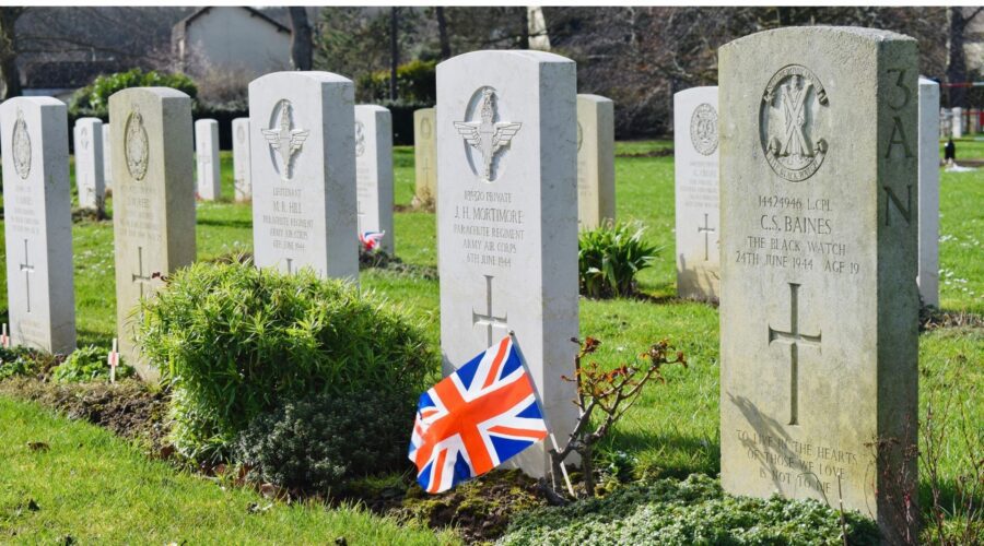 Bény-sur-Mer Canadian War Cemetery individual headstones paratrooper Mortimore Black Watch Baines Union Jack flag - Paris Beyond Tours